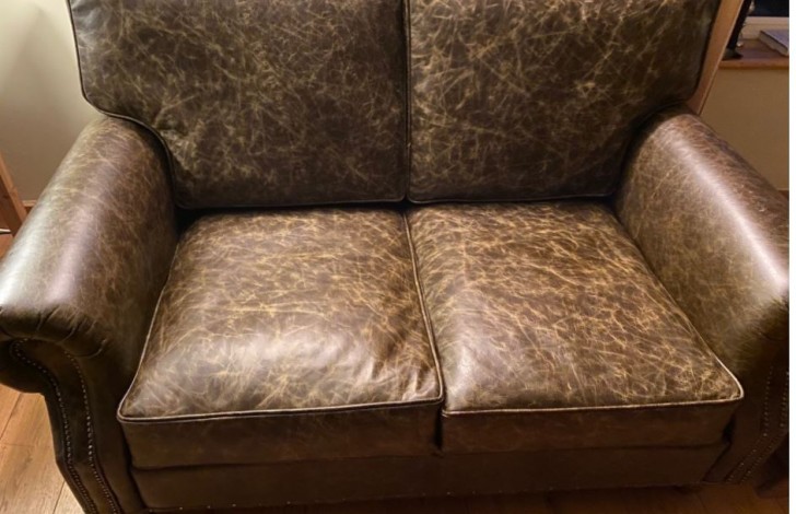 Old leather outlet couch for sale